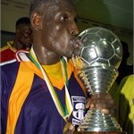 Jacob Nettey kisses Hearts' first ever Africa Champions League in 2000.